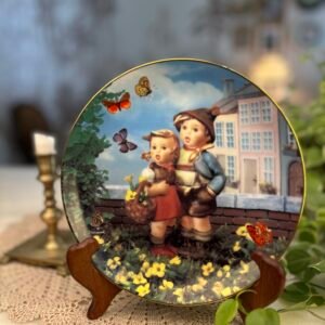 Prato decorativo Surprise – M. I. Hummel | Little Companions | Danbury Mint